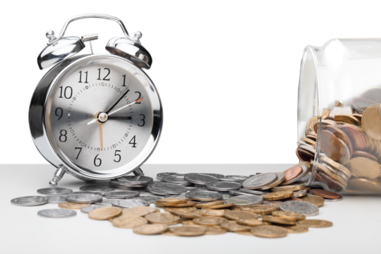 Alarm clock and money coins in glass jar