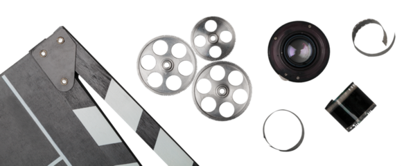 vintage classic clapperboard and lenses and videotape