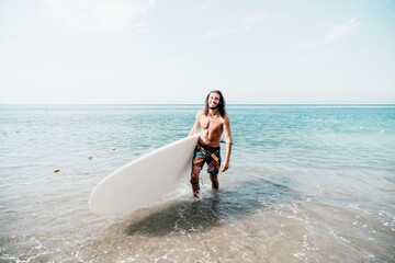 Sea man sup. Asian athlete man swimming in sea and paddleboarding at summer sunset. Healthy strong male enjoy outdoor active lifestyle and water sports on holiday vacation. Slow motion