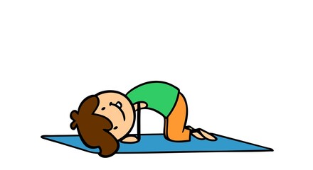 Boy doing cat pose at kids yoga