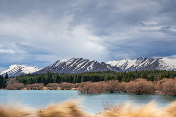 Beautiful view of Lake Tekapo in the morning. Photo taken at winter season with snow capped southern alps at the background.