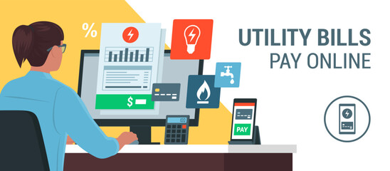 Woman paying utility bills online