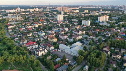 Fototapeta premium Minsk, Belarus - August 17, 2022: The private sector in the capital of Belarus, the city of Minsk. Private households inside the urban area. City townhouses and cottages in Europe. European city.