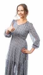 woman in blue dress shows class, thumbs up. isolated white background