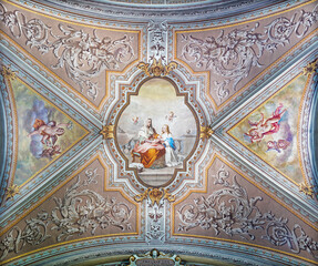 DOMODOSSOLA, ITALY - JULY 19, 2022: The neo-baroque fresco of St. Ann with the Virgin Mary on the...