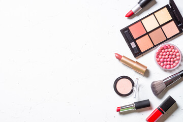 Make up and cosmetic products on white background.