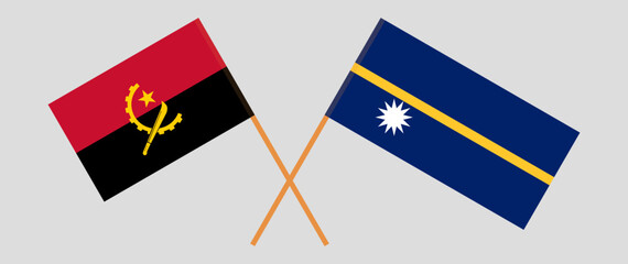 Crossed flags of Angola and Nauru. Official colors. Correct proportion