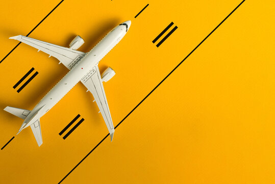 Travel Planning. Airplane on runway with blank space. Preparation for Traveling. Copy space, mockup or template