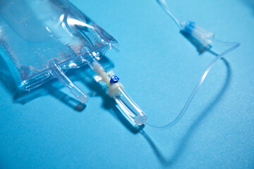  Infusion bag in the blue background. IV drip chamber