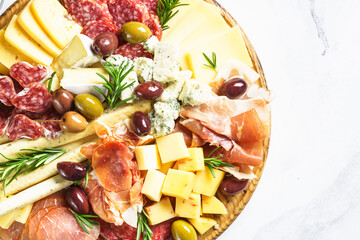 Antipasto platter with jamon, salammi and cheese assortment.
