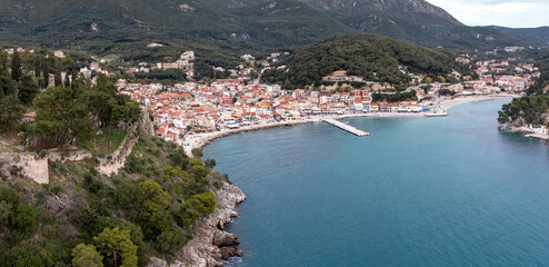 Greece Parga Epirus. Aerial drone view of coastal Ionian city traditional building nature background