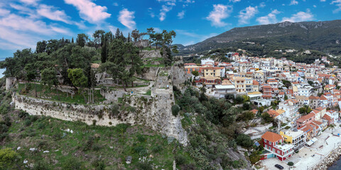 Parga city, Greece aerial drone view view of Venetian Castle ruins, coastal traditional building.