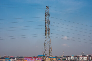 Power transmission pole spotted  along Ebute metta at sunrise,  Lagos - Nigeria on Tuesday, ...