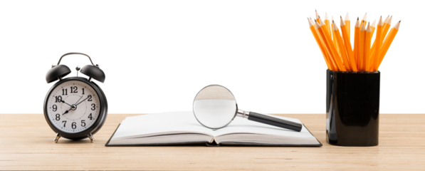 Open books with colored pencil on the desk