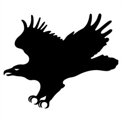 Black silhouette of an eagle in attack