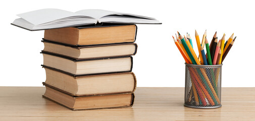 Stack books with colorful pencil on the desk