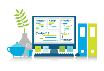 Coding and software development concept. Computer screen showing sample programming codes in the office or home environment.