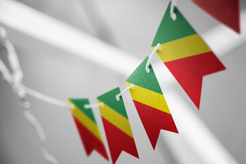 A garland of Congo national flags on an abstract blurred background