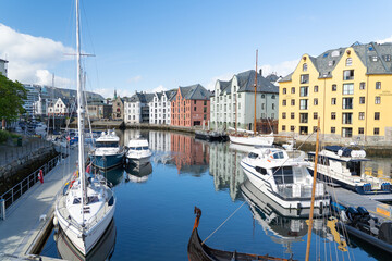 Fototapeta na wymiar Small boats in Alesund, Norway