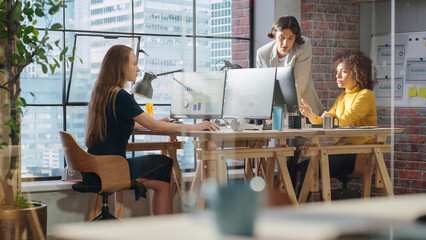 Creative Multicultural Colleagues Collaborate on a Project and Work Together as a Team. Marketing...