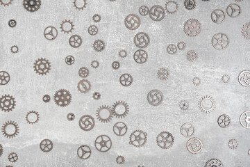 Abstract, gray concrete background with gears.