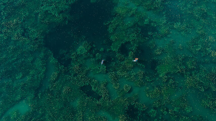 Aerial view of canoe on amazing lake 