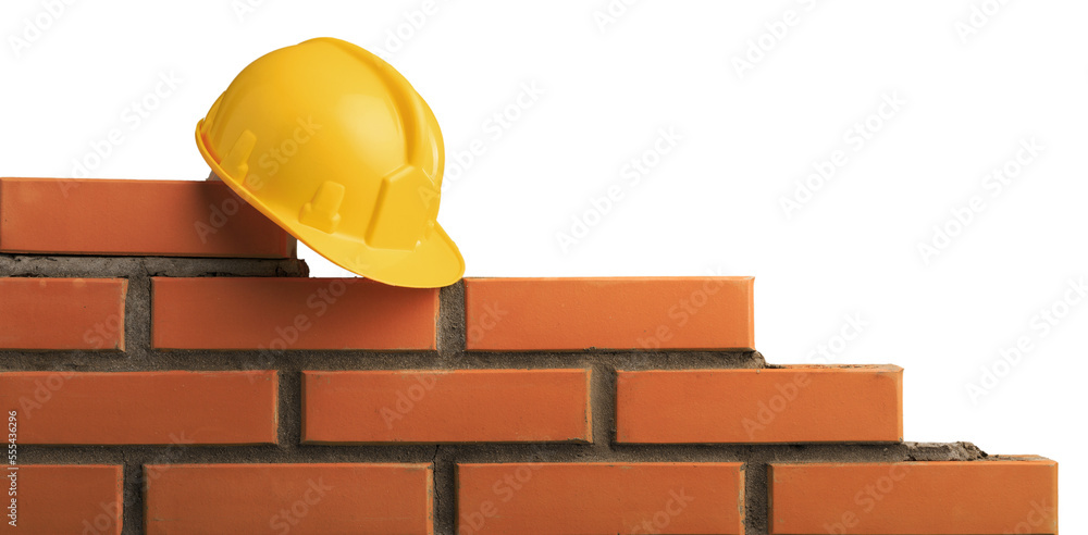 Wall mural Hard hat on cement masonry layer