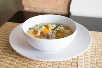 Vegetarian Asian soup. Traditional North Asian recipe with spices such as curry and herbs such as coriander.