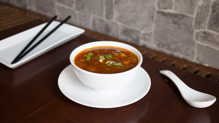 Vegetarian Asian soup. Traditional North Asian recipe with spices such as curry and herbs such as coriander.