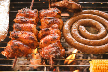meat on the grill. South African braai meat with mielies or corn on the cob
