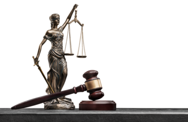 Brown justice statue with scale and wooden gavel