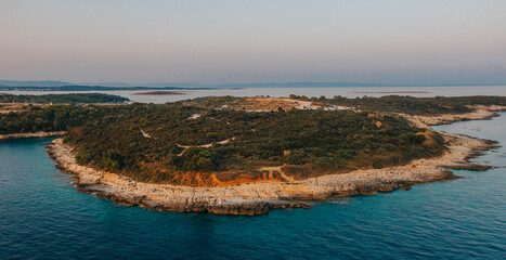 Aerial view of small picturesque village situated on the top southernmost tip of the Istrian peninsula just south of the city of Pula in Croatia. Premantura landscape 