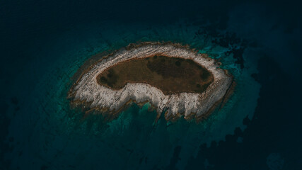Aerial view of  Fenoliga “The dinosaurs island” Premantura Kamenjak - 555444867