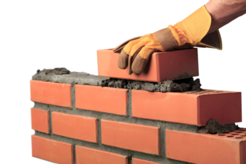Man worker installing brick masonry wall with a trowel