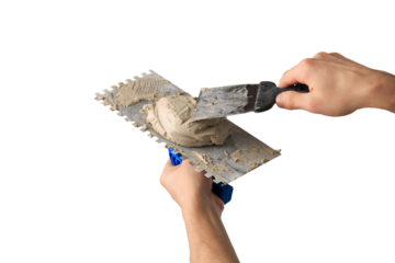 Human hands of plasterer at work with concrete