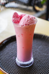 Strawberry protein shake, Fresh Milkshake topped with strawberry ice cream, A glass of strawberry smoothie.