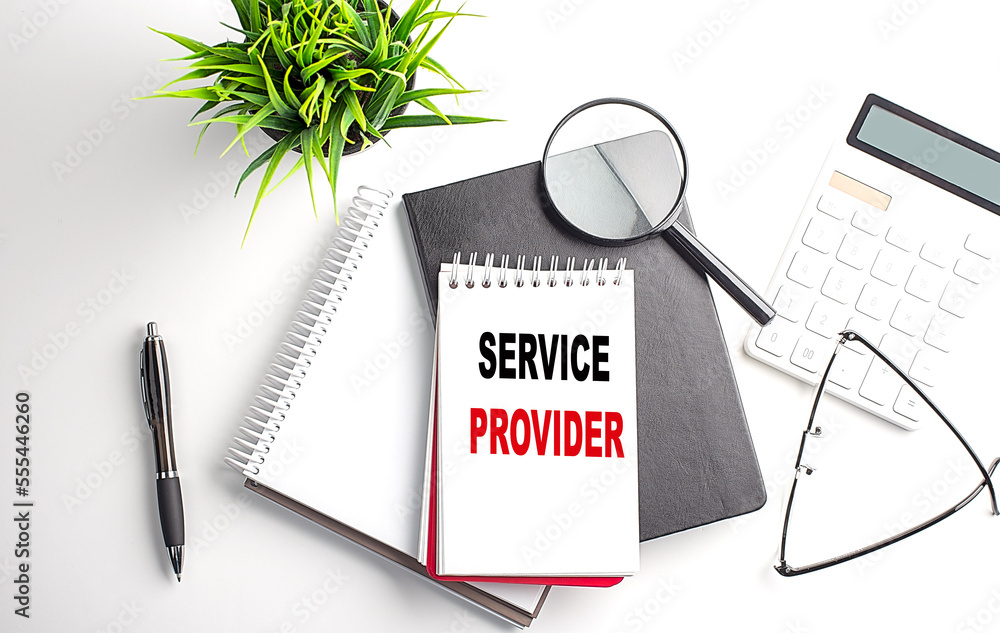 Poster text service provider on notebook with office tools on white background