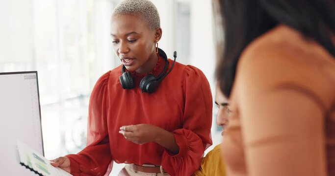 Call center coach, team and black woman with telemarketing training, kpi and target in office. Crm mentor, coaching and customer service expert with team, planning or goals in modern office in London