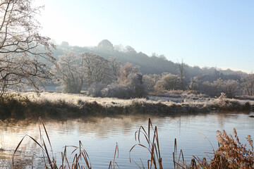 Winter reflections on the River Wey on a cold and frosty day.