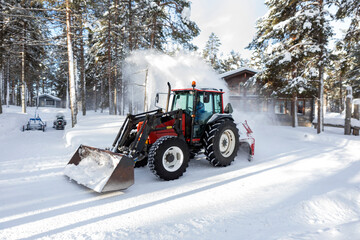 tractor in winter that slides snow