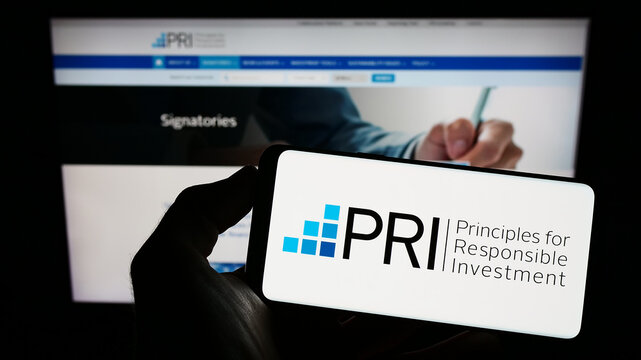 Stuttgart, Germany - 12-19-2022: Person Holding Cellphone With Logo Of UN Principles For Responsible Investment (PRI) On Screen In Front Of Webpage. Focus On Phone Display.