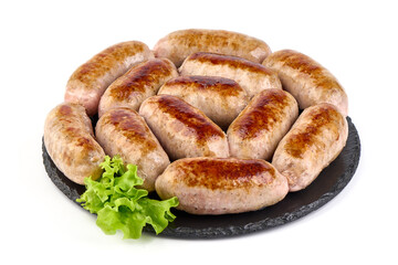 Grilled pork bangers, isolated on white background.