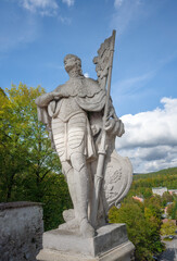 Fototapeta premium Saint Wenceslaus Statue at Cloak Bridge of Cesky Krumlov Castle - Cesky Krumlov, Czech Republic