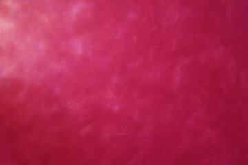 abstract red background with sparkles liquid waves and motion