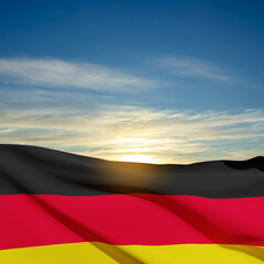 Naklejka premium Flag of Germany against blue sky. EPS10 vector
