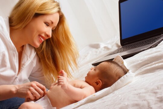 Mother And Child, Computer In Background