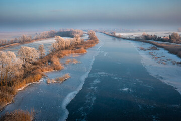 Fototapeta na wymiar Frozen landscape of Vistula Fens, Poland