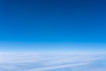 Bright blue sky gradient background. Clear empty sky texture, blank skyscape poster with no clouds....