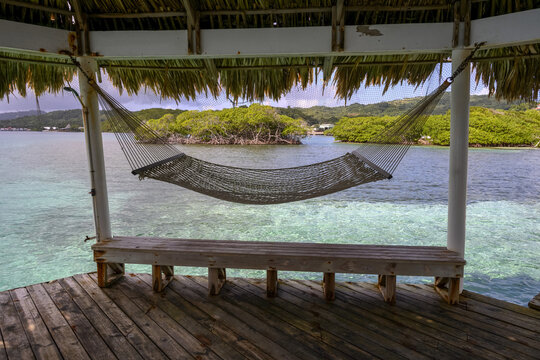 Hammock on a dock; Bay Islands Department, Honduras