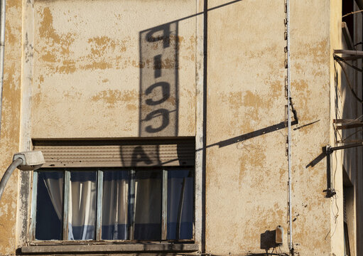 Shadow of an advertisement on a building; Asmara, Central region, Eritrea